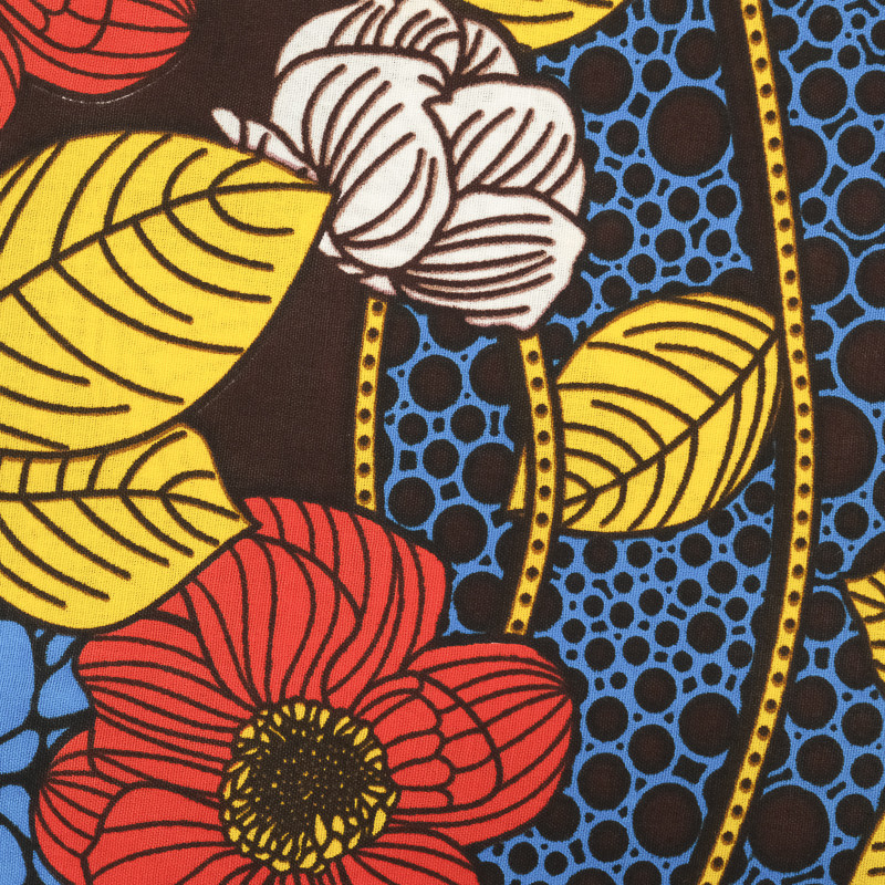 Red Flower Wax Fabric on a Blue Background - Maison Klem